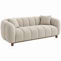3-zits gebogen bank van beige polyester bouclé met donkerbruine houten poten, 230 x 95 x 78 cm